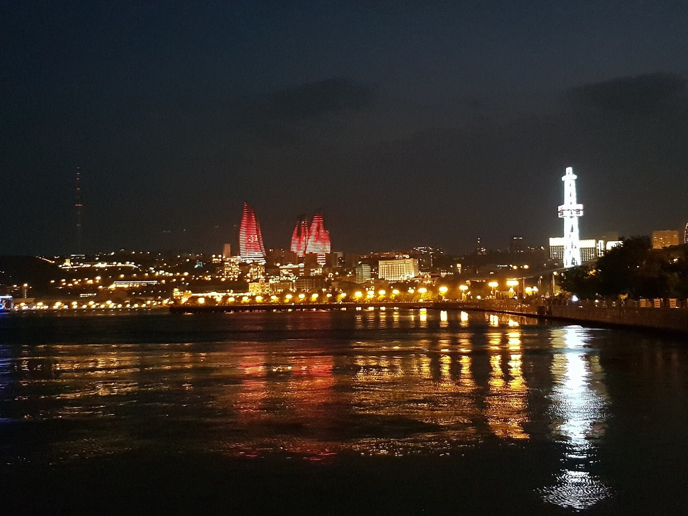 The Flame Towers of Baku lit red at night