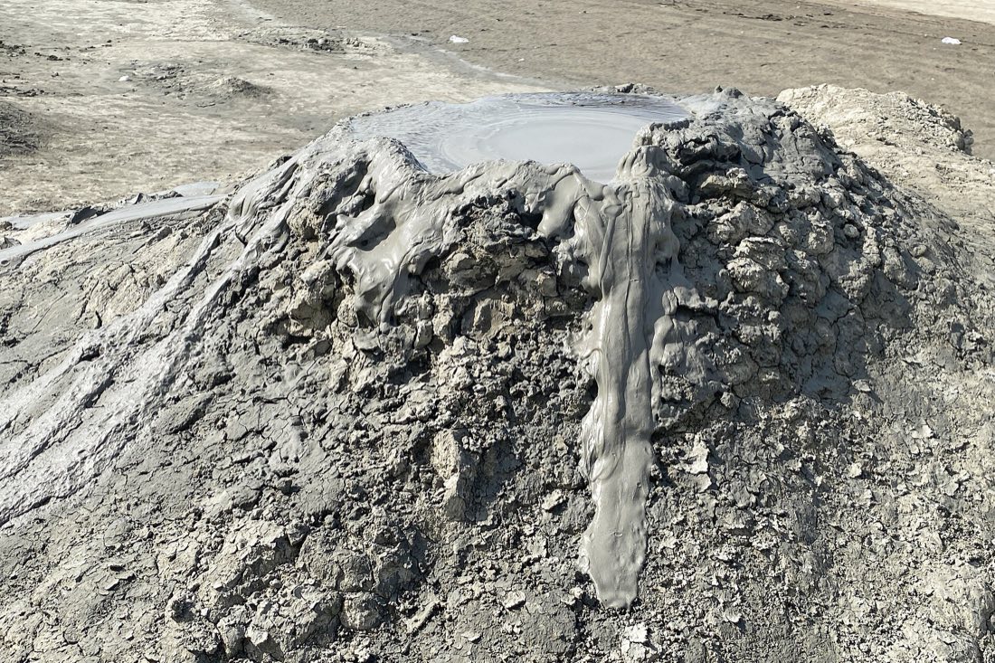Bubbling mud volcano cone at Qobustan, Azerbaijan